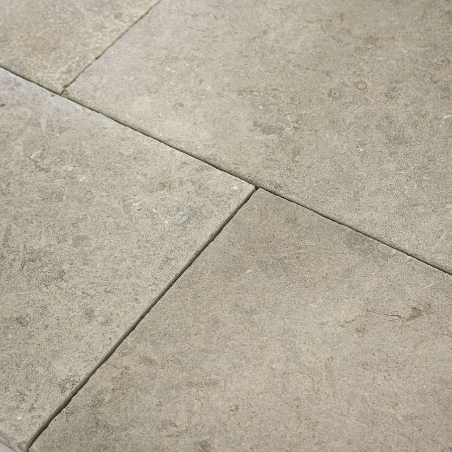 Roven aged & brushed limestone